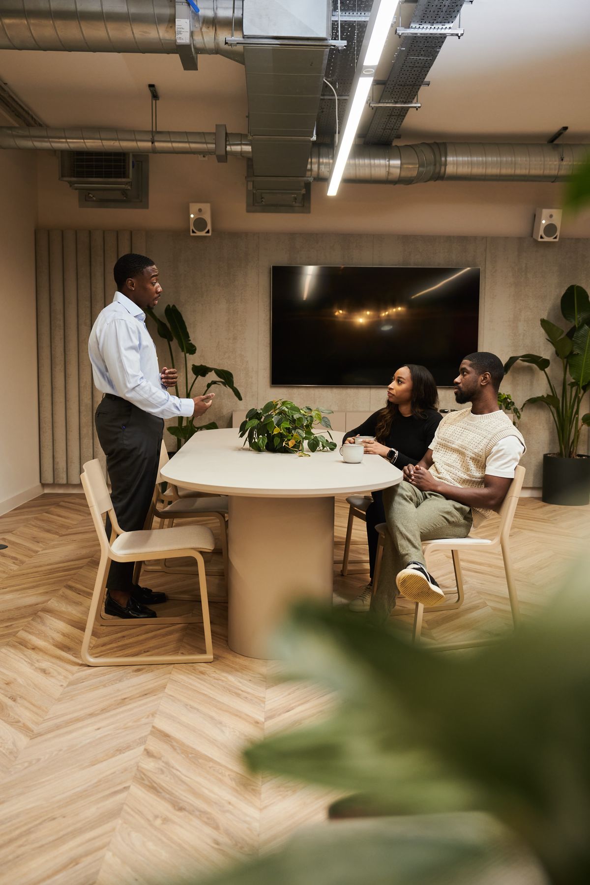 an accountant presenting to two people